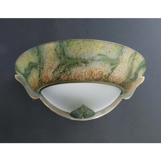 Vintage Italian wall light with a multicolored Murano glass shade and a green metal leaf at the base / Made in Italy in...