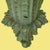 A pair of green ornamental brackets — carved and pierced wall brackets in a rich green finish with gilded accents. They...