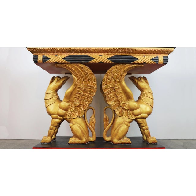 vintage Gilt Gryphon Also Known As "Griffin" .19Century Carved Giltwood Console Table.Supported by two sculptures Griffin...