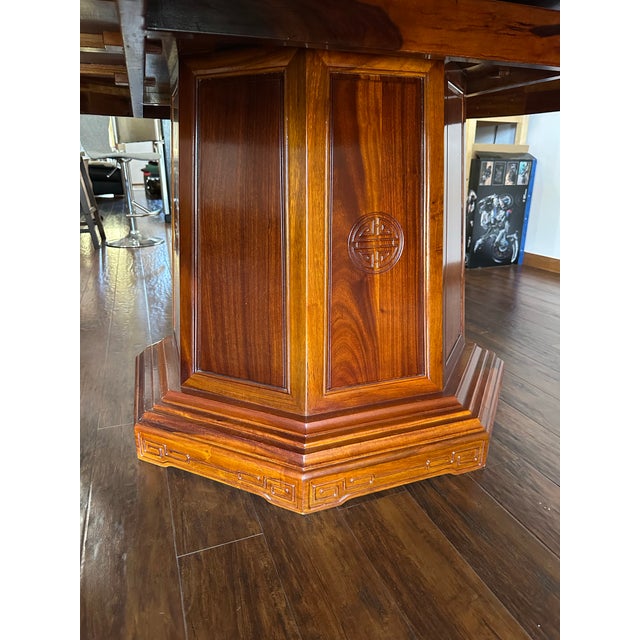 A magnificent and beautifully crafted vintage Chinese dining set made of premium solid Burmese Rosewood (Huali wood). This...