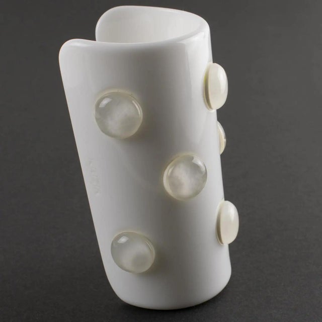 Krizia Italy designed this stunning lucite or acrylic bangle bracelet. The oversized cuff design features an opaque white...
