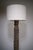 Large Makonde floor lamp in carved wood, made in East Africa during the 1950's. The exceptionally stem brings together a...
