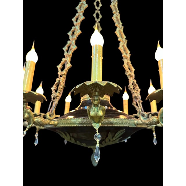 This fully restored chandelier is such a gem! When we received it, one Mermaid was missing, so we had to have it recast by...