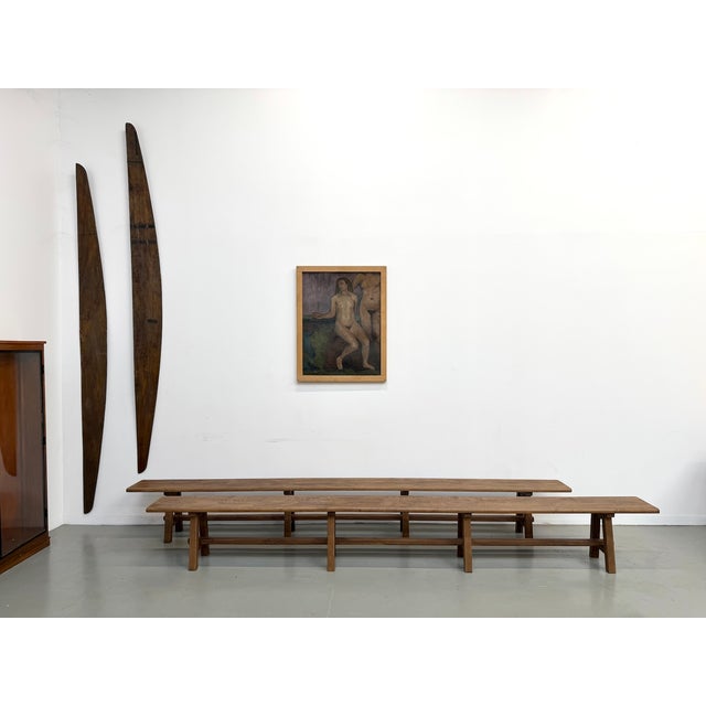 Maison lecan presents a rare find: a pair of monumental solid oak benches dating from the 1950s. At an exceptional length...