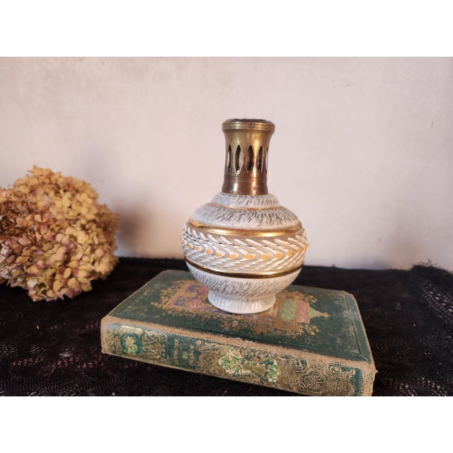 Original French 'Lampe Berger' each made by Jaques Breugnot, signed BO, in France during the 1950s. There is a series of...