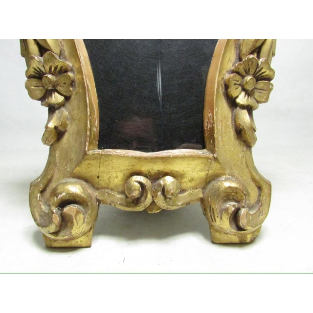 Antique Italian giltwood photo or picture frame, c.1870 in the Rococo style. Hand carved solid wood frame, with an...