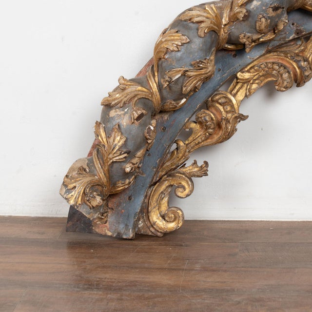Late 18th century large architectural fragment from Portugal, retaining its original painted finish. The curved form is...
