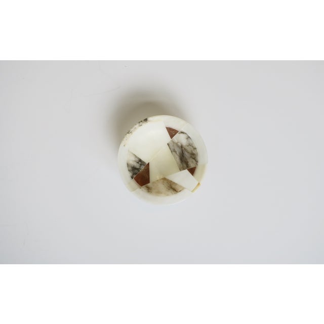 A small beautiful Italian marble bowl with patchwork design, circa late-20th century, Italy. This small hand-made bowl, a...