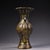 This is a cast bronze vase featuring extensive gold inlay (gilt bronze) decoration. The vessel has a flared mouth, a...