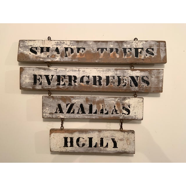 Beautifully aged vintage painted 2-sided wood farm/nursery hanging four-part sign. This is four independent signs attached...