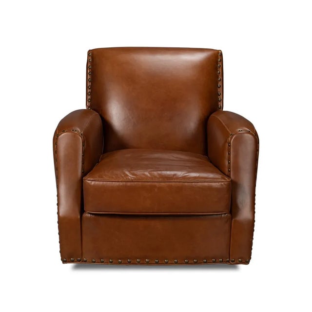 A classic style Havana Brown leather upholstered armchair, upholstered with pure aniline top grade leather, with large...