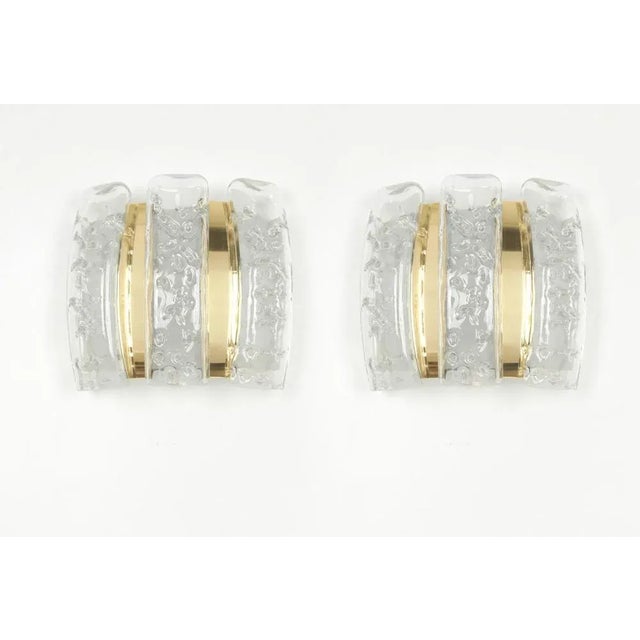 Wonderful pair of midcentury wall sconces with ice glass pieces, made by doria leuchten, germany , manufactured, circa...