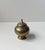 A very well-made trinket or tea jar executed in hand-hammered and hand-embossed thin brass. Its interior is linned with...