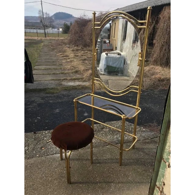 Vintage brass vanity table and it's matching stool. Size :162 x 81 x 41 cm