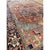 his late-19th-century Heriz carpet is a magnificent representation of the rustic weaving traditions from northern Persia....