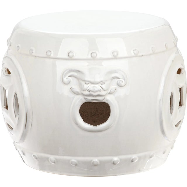 A masterwork of ceramic artistry, the antique white Double Coin indoor-outdoor garden stool is lavishly detailed in a...