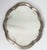 This is a unusual mirror made for decorating the table. The mirror is made with a frame in pewter in baroque style and...