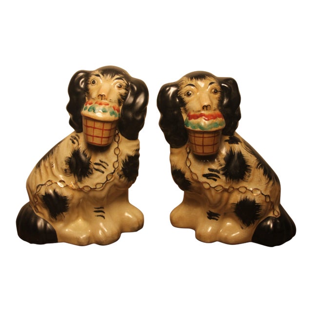 Early 20th Century Staffordshire Black and White Dog Figurines- A Pair For Sale