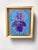 In "Feline Natura," a vibrant iris flower transforms into a whimsical feline visage, merging botanical beauty with playful...