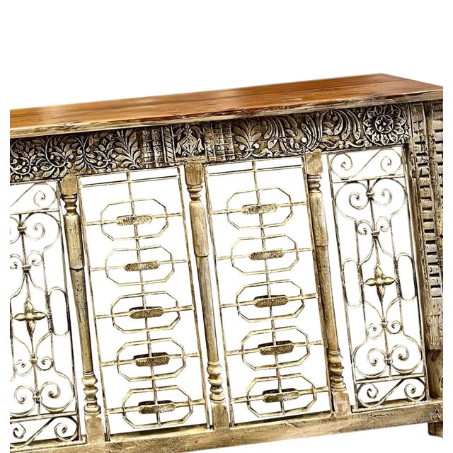 Wrought Iron Carved antique Console Table. Showcasing a striking floral design and unique iron lattice work, this rustic...