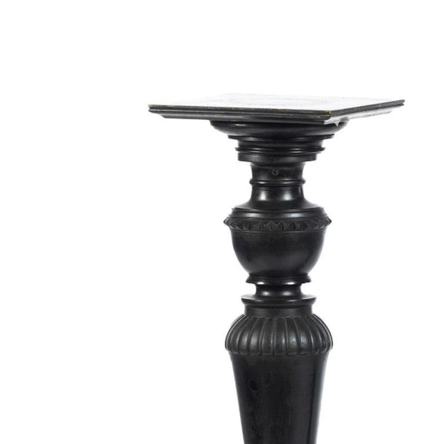 Furniture - Two columns - 19th century. Portuguese; 19th century, made of darkened wood. Traces of treated woodworms....