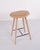Pair of bar stools by mater made in oak with seats upholstered in natural leather. Mater is a danish furniture...