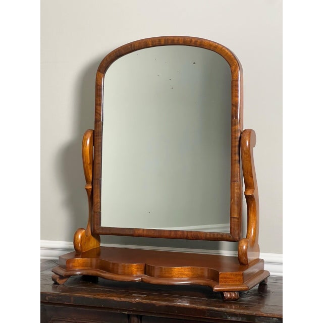 Victorian style mahogany footed dressing table cheval mirror, England, circa early 1910s. A special mirror of a large size...