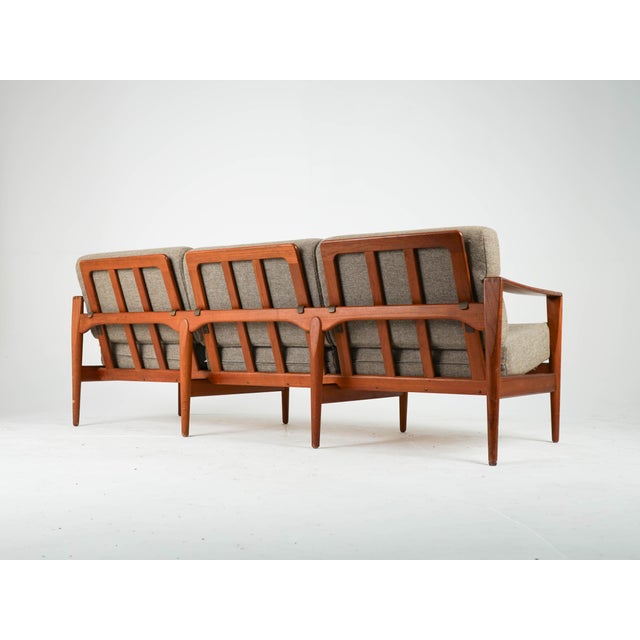 Vintage Three-Seater Sofa in Teak by Illum Wikkelsø, 1960s, in Very Good conditions. Designed 1960 to 1969 This piece has...