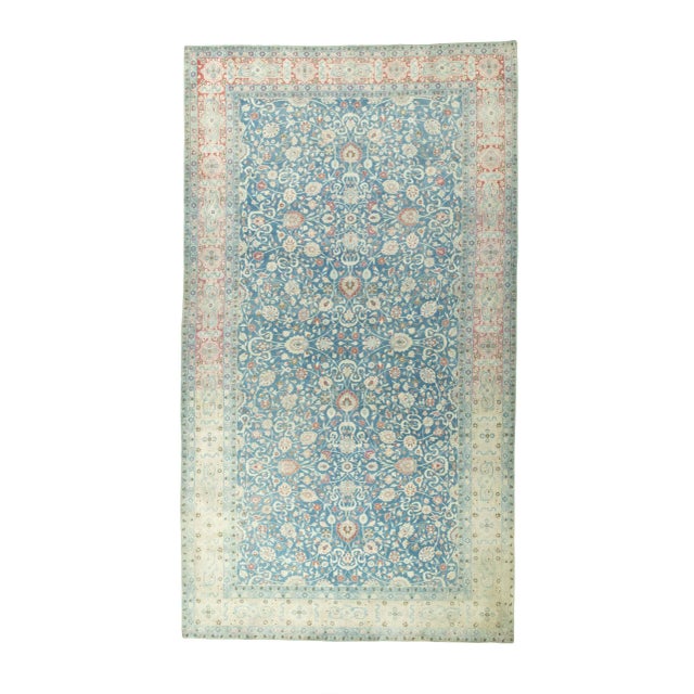 This exceptional hand-knotted designer rug combines classic oriental ornamentation with a modern vintage aesthetic. Its...