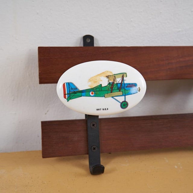 Teak wall coat hanger, airplanes height: 18 width: 49 additional information style: vintage production period: 1960 – 1969...