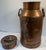 Gorgeous antique French copper milk can with writing on top indicating dairy name and product