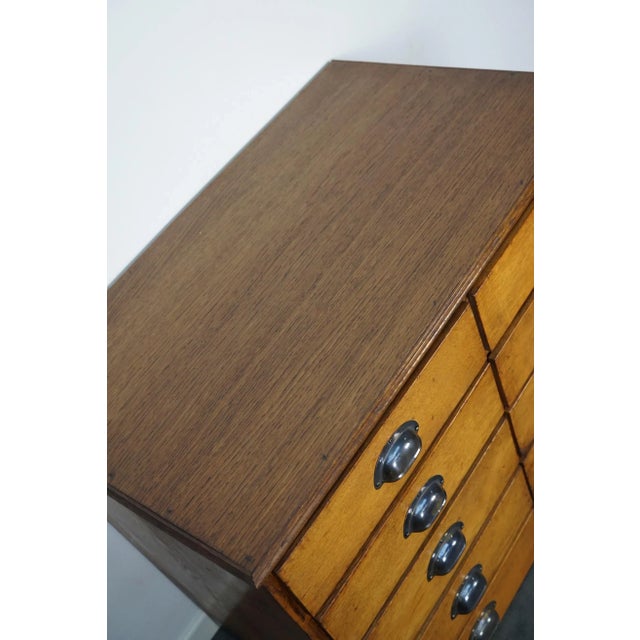 This apothecary cabinet was made circa 1940s in Germany and was later used in a hardware store in Belgium until recently....