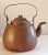 A very old hand forged copper kettle with original patina. There is an old repair to the handle that gives the handle a...