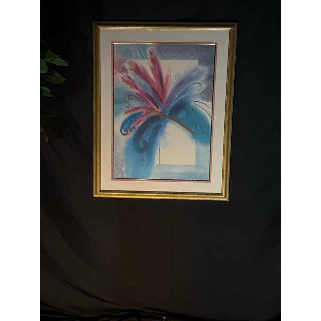 A beautiful vintage framed abstract floral print featuring expressive botanical forms in soft blue, teal, pink, lavender,...
