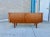 This sleek mid-century modern credenza features clean lines, rich walnut frame, and functional design. Equipped with...