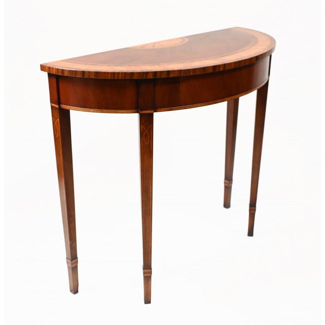A gorgeous single Regency style console table in mahogany with satinwood cross banding. Quality refined piece perfect for...