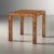 Modern square burl end table with Parson style legs and a rustic warm brown finish and subtle distressing under a hand...