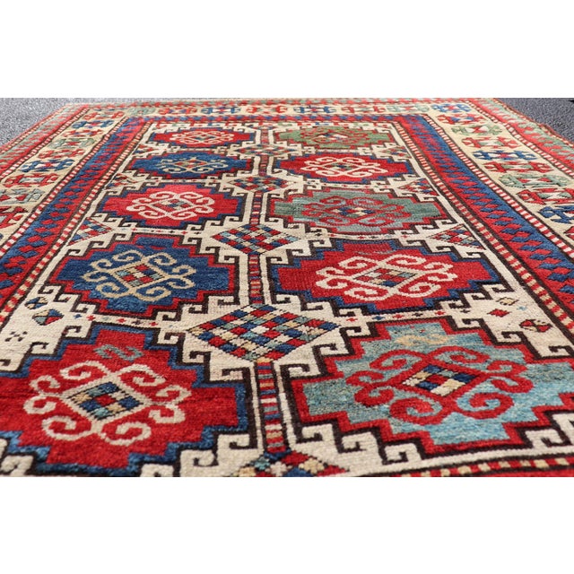 Cream Antique Moghan Kazak Rug Showcasing Bold Geometric Medallions 4'6 X 6' For Sale - Image 8 of 11