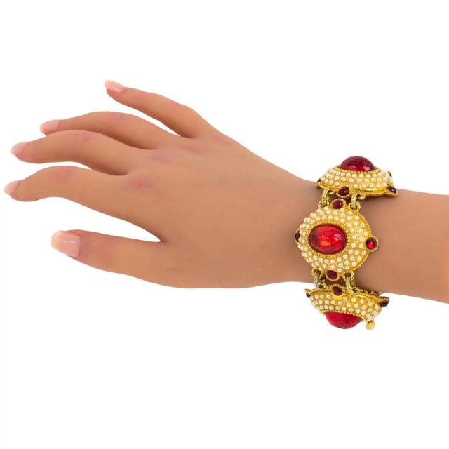 This lovely French Designer Chantal Thomass Paris jeweled link bracelet features gilded-metal carved and domed elements,...