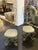 Pair of French Art Deco Garden chairs with bronze plated wrought iron chairs. The backs and legs of these chairs feature...