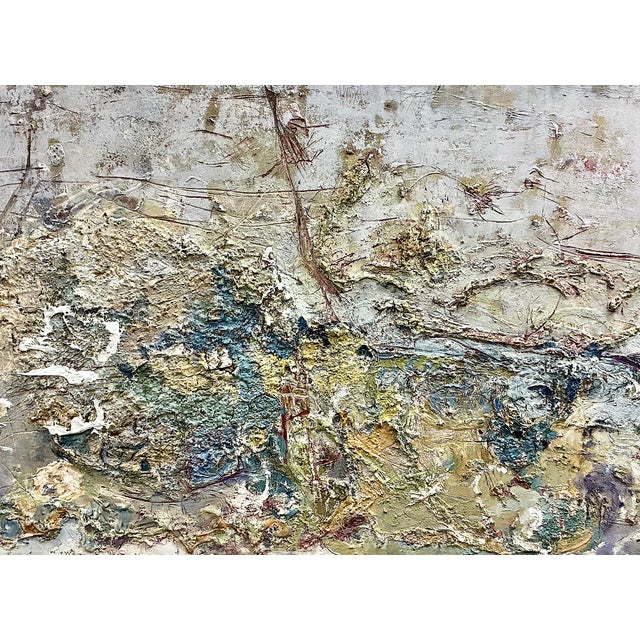 Layers upon layers of paint and other media, marked by incisions, have created a dense weathered texture that appears...