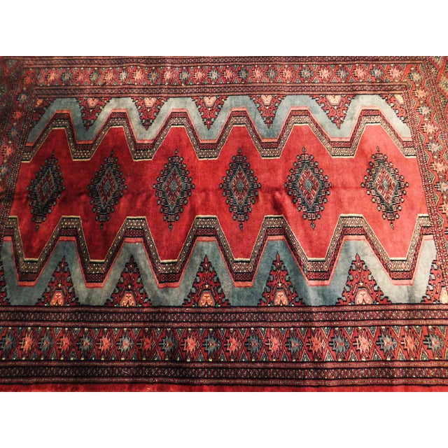 Repeating geometric motif with a velvety texture. Soft 100% pure wool pile on cotton foundation. Finely woven. Circa 1980.