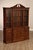 High Quality American Made Cherry Breakfront China Bookcase with Four Glazed Doors Opening to Lighted Interior and...