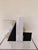 Early 21st Century Arteriors Ivory Rice Stone and Black Bookend (Small) For Sale - Image 5 of 5