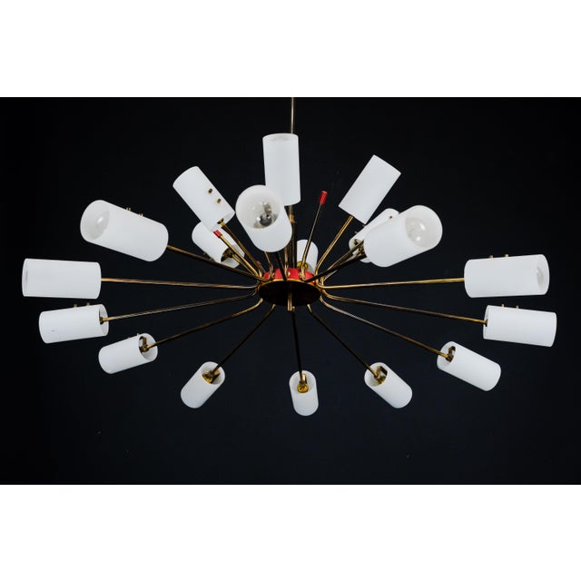 Large Mid-Century 18 arms chandelier in the manner of Arredoluce. Italy 1950s A striking large-scale Mid-Century...