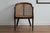 Add a touch of vintage charm to your home with this classic cane armchair. Featuring a beautifully handwoven rattan back...