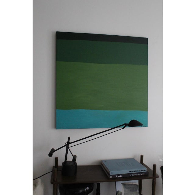 This work unfolds like an emotional landscape imbued with calm—a dialogue between depth and light. Overlapping bands of...