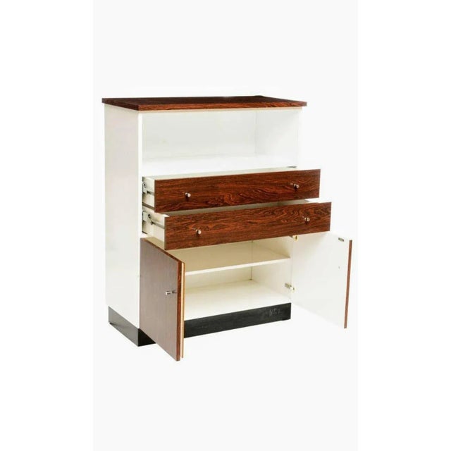 An impressive, very good quality mid-century cabinet, Art Deco Moderne taste, finished in stunning rosewood with white...