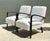 This sophisticated pair of vintage Mid-Century Modern lounge chairs exemplifies the clean lines and sculptural elegance...