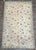 This charming 1920s Portuguese rug features a delicate allover floral composition rendered in a beautifully restrained...